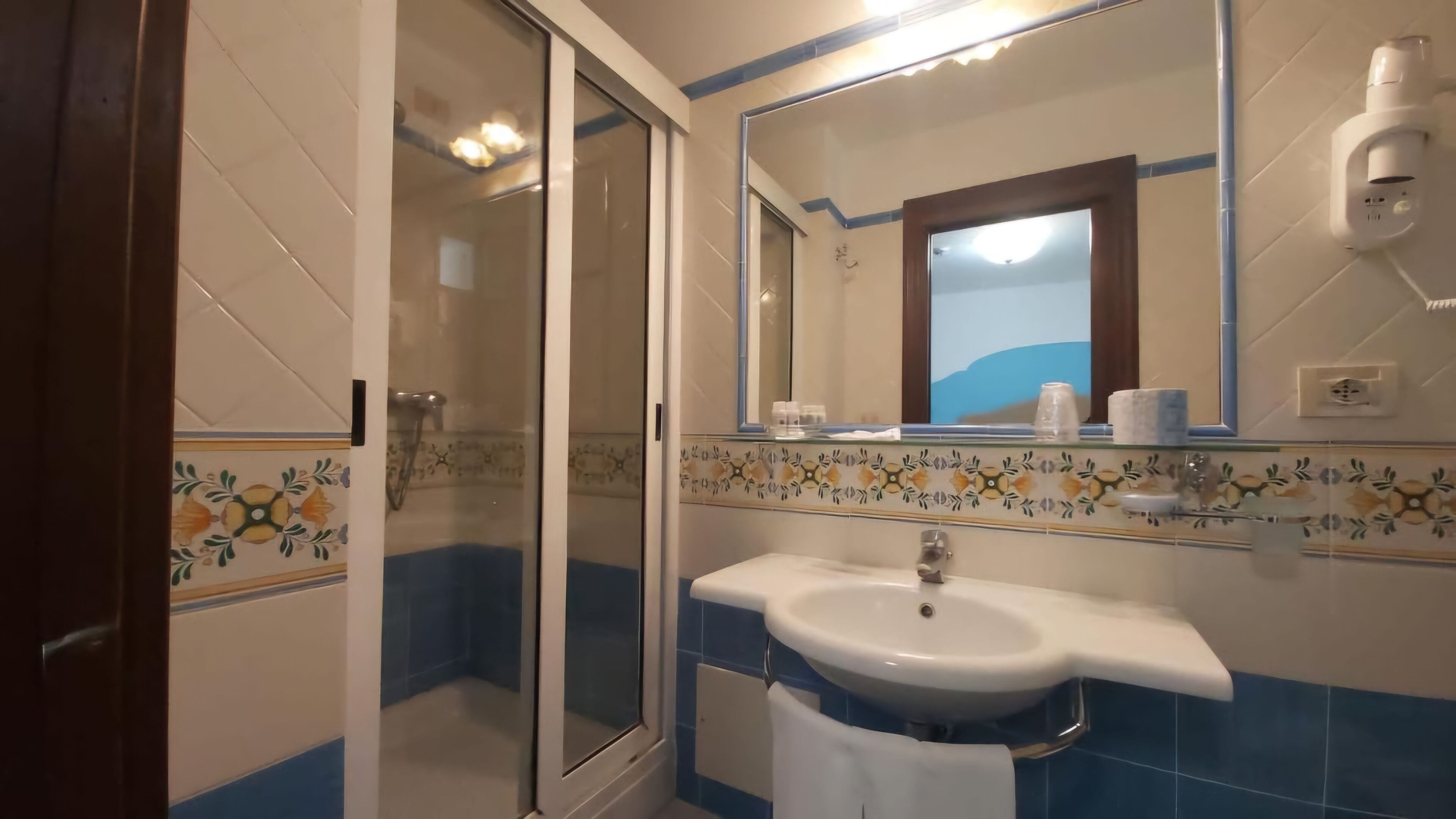economy double or twin room | bathroom | free toiletries, hair dryer, bathrobes, bidet