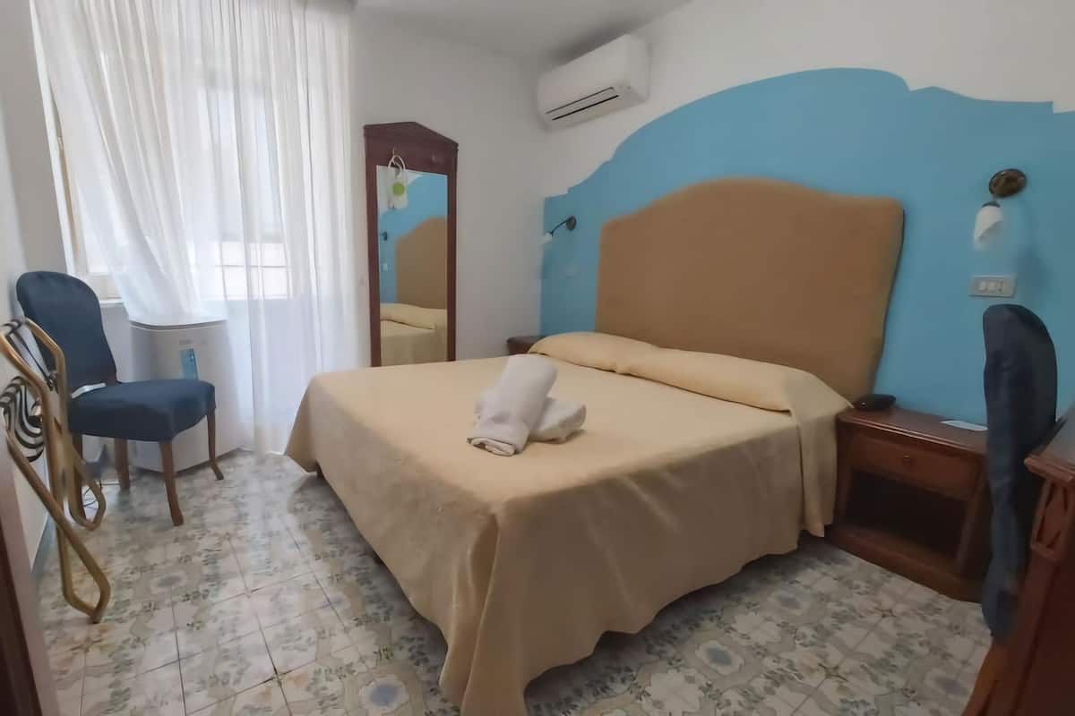 Economy Double or Twin Room | In-room safe, desk, free WiFi, bed sheets