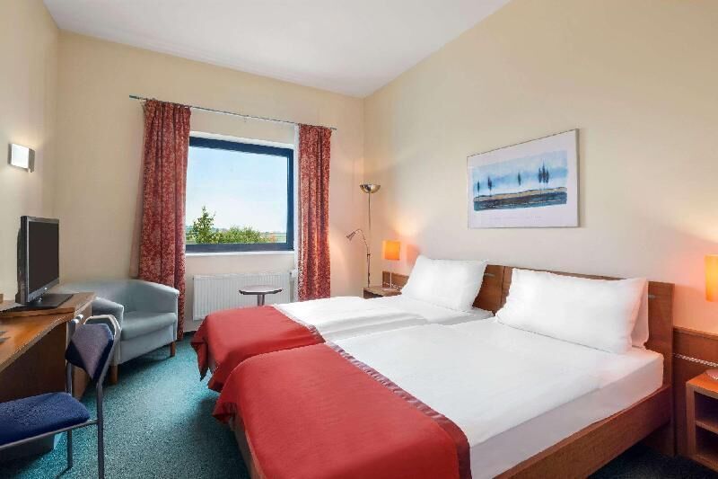 Hypo-allergenic bedding, minibar, in-room safe, desk