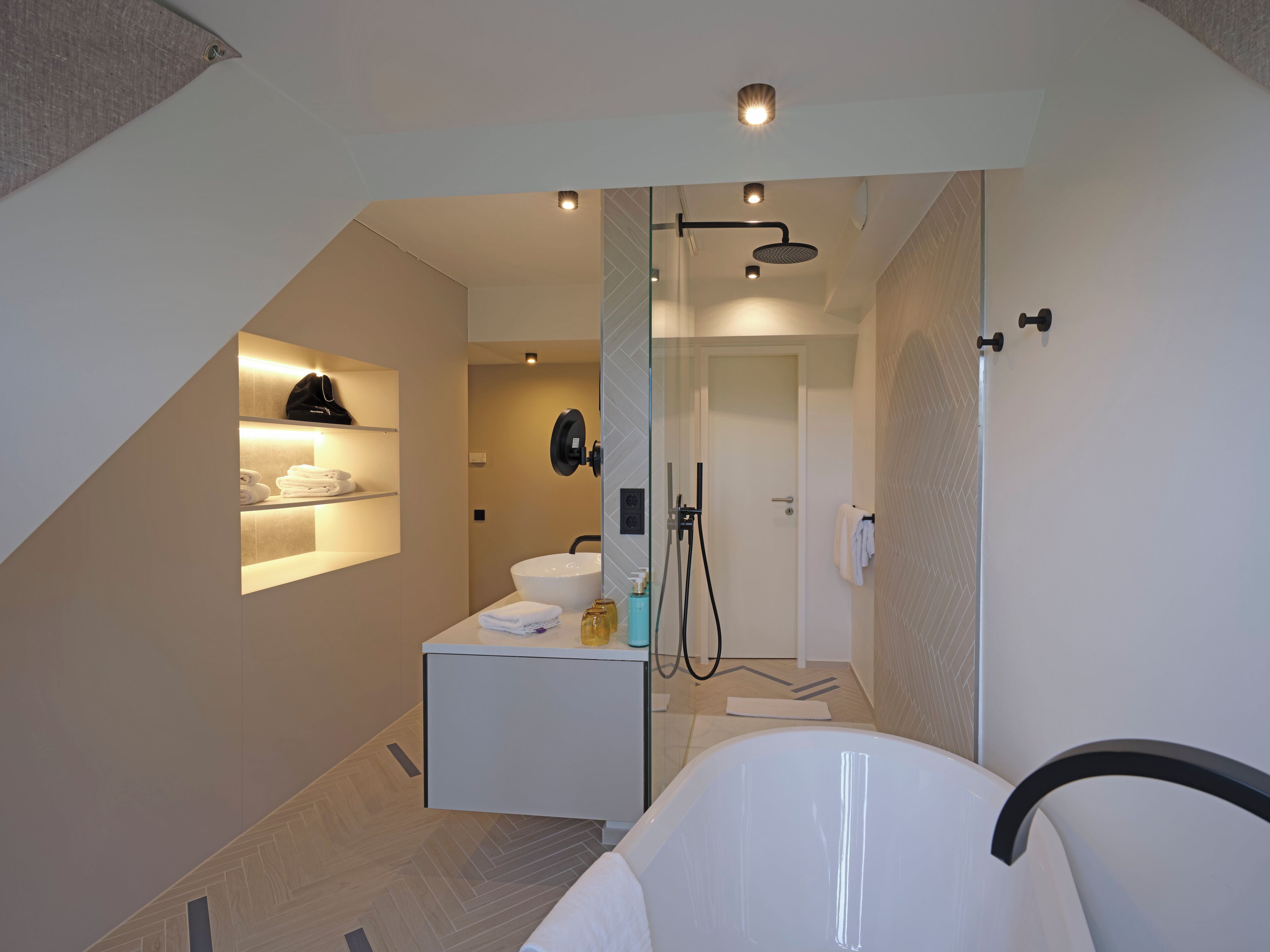 superior suite with skyline view | bathroom | eco-friendly toiletries, hair dryer, towels, soap