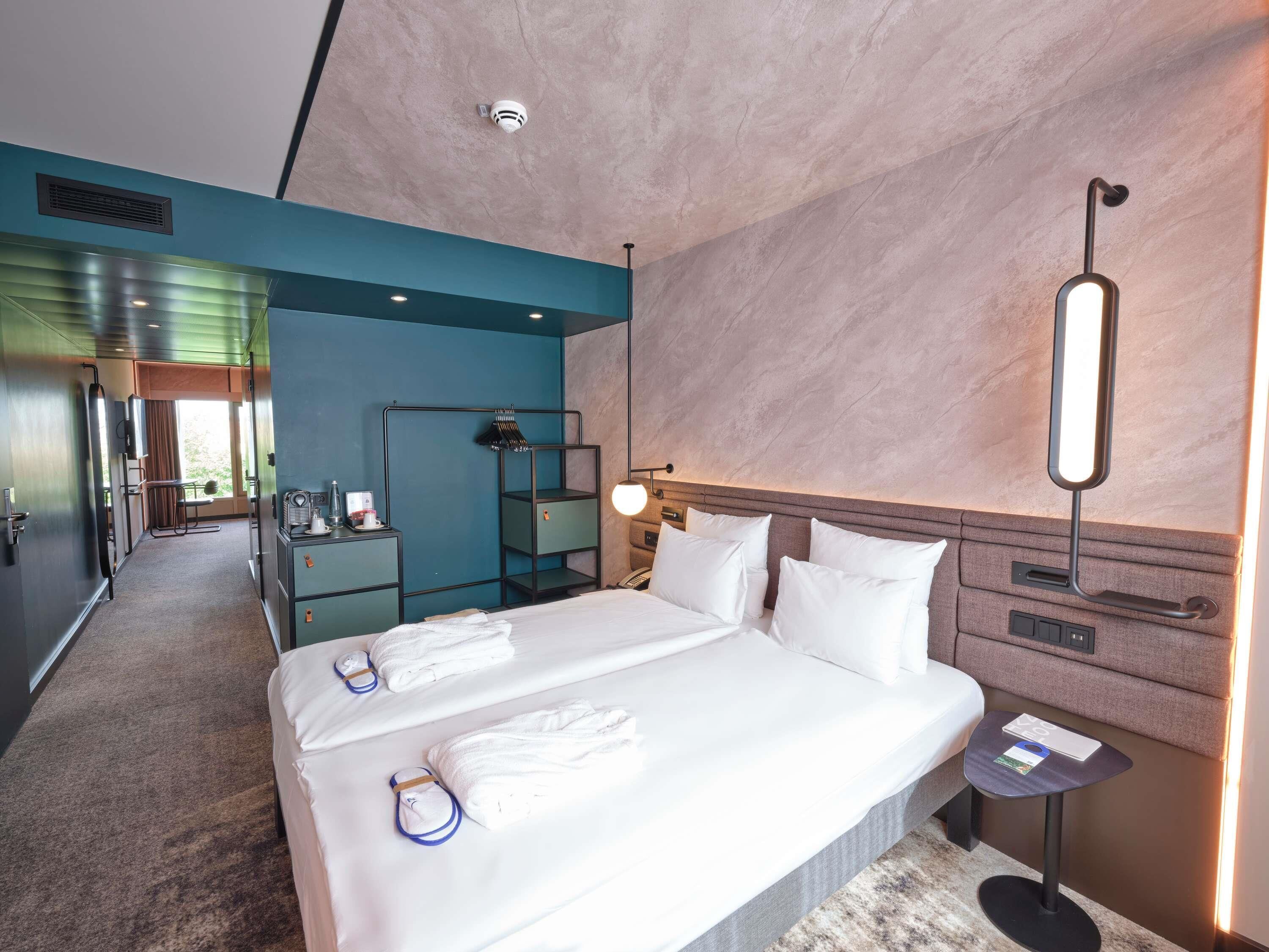 Hypo-allergenic bedding, in-room safe, laptop workspace, soundproofing