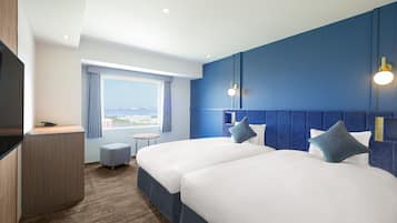 Down comforters, blackout drapes, iron/ironing board, free WiFi