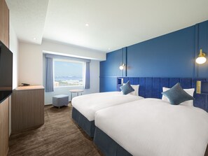 Down comforters, blackout drapes, iron/ironing board, free WiFi