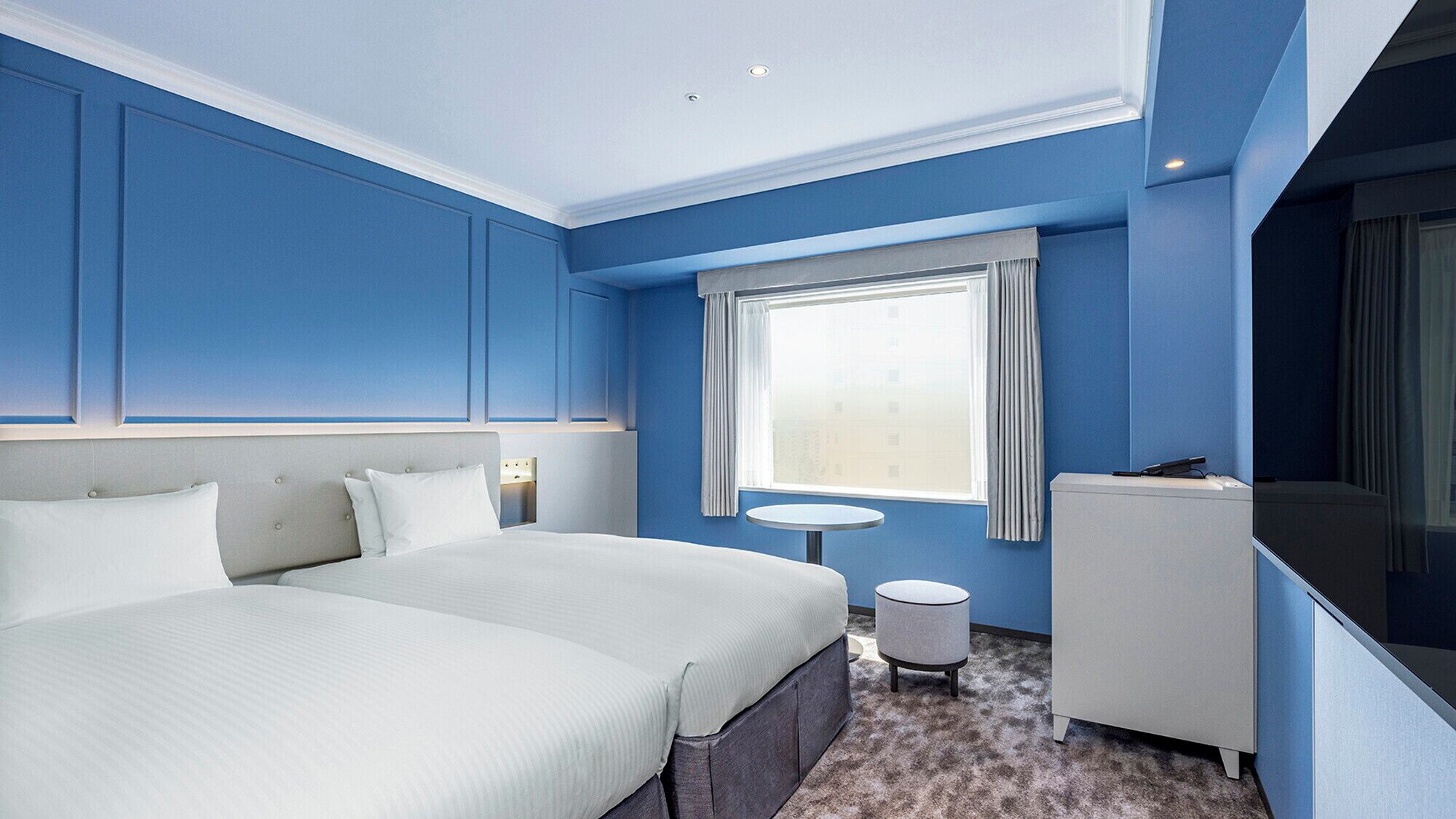 Down comforters, blackout drapes, iron/ironing board, free WiFi
