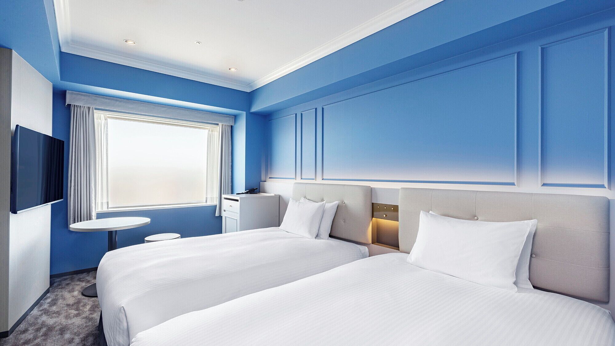 Down comforters, blackout drapes, iron/ironing board, free WiFi