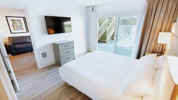 Premium bedding, pillow-top beds, laptop workspace, blackout curtains