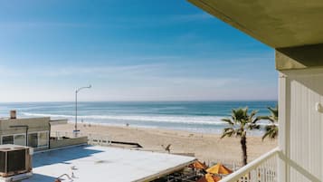 Suíte júnior, 1 cama King, vista para o oceano | Terraço/pátio