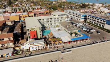 On the beach, surfing