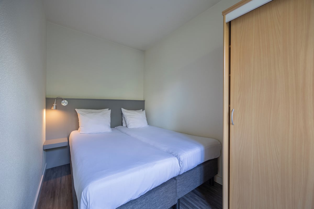 Comfort appartement | 1 slaapkamer, hypoallergeen beddengoed, een kluis op de kamer