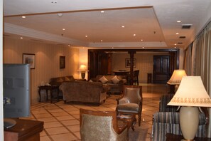 Business suite | Living room | 27-cm LCD TV with premium channels, TV - The Bristol Hotel (Gurugram)