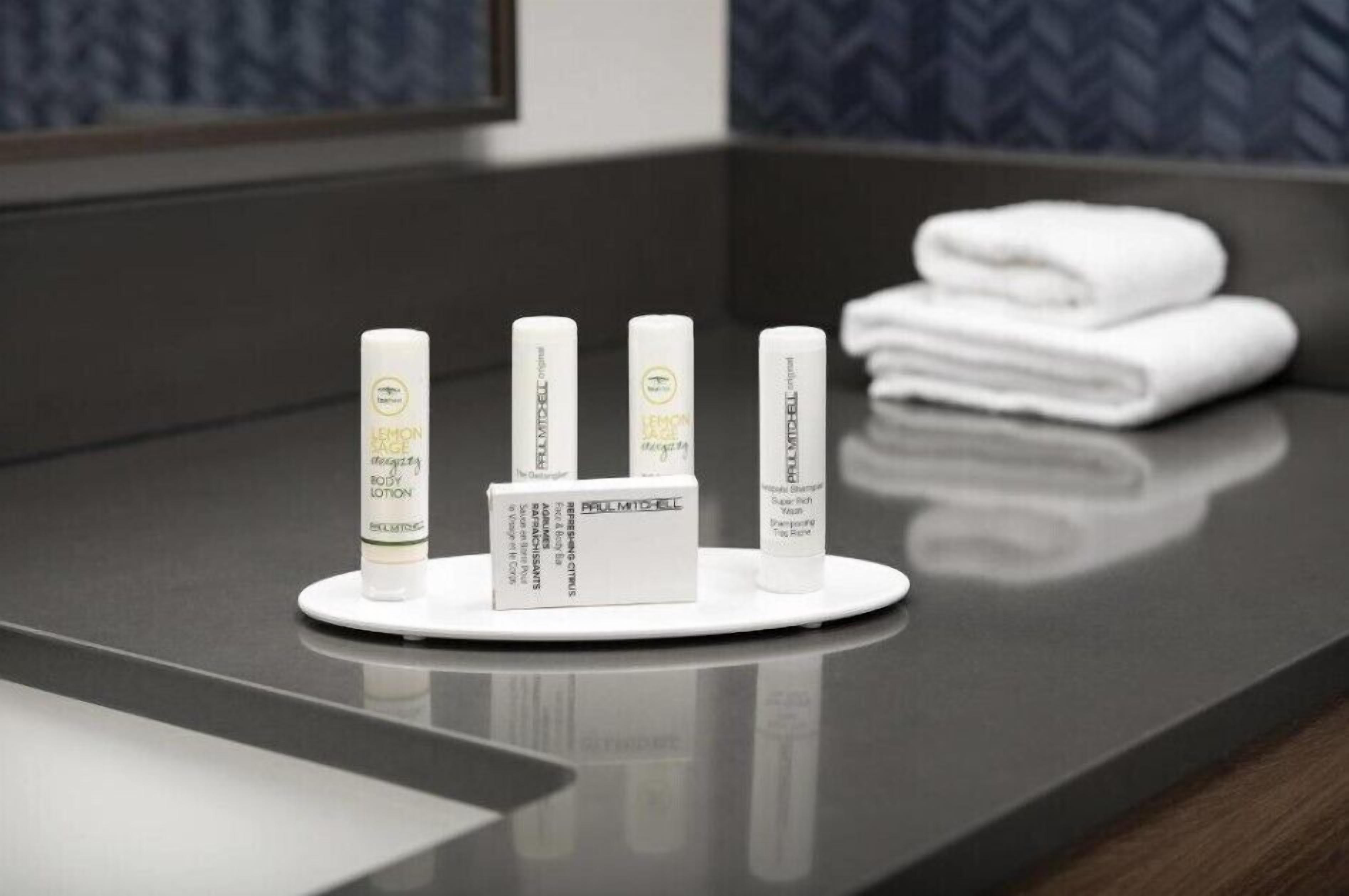 separate bathtub and shower, free toiletries, hair dryer, towels