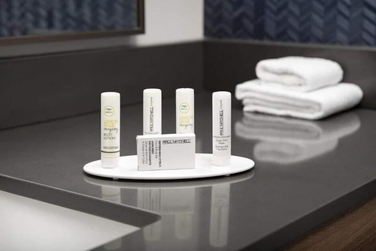 separate bathtub and shower, free toiletries, hair dryer, towels