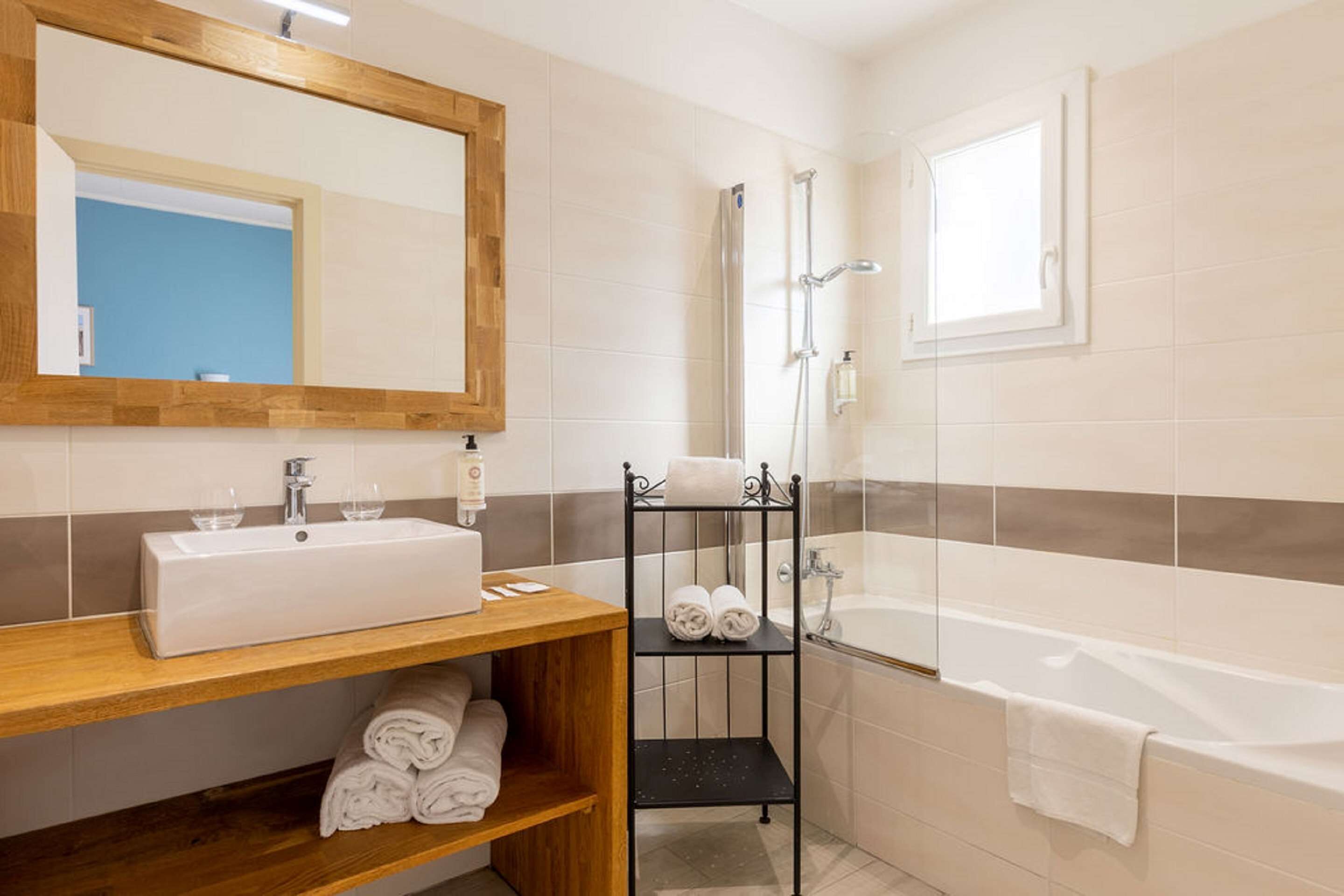 family room, multiple beds, balcony, garden view | in-room safe, iron/ironing board, free wifi, bed sheets