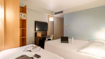 Standard Room, Multiple Beds | Minibar, in-room safe, desk, blackout drapes