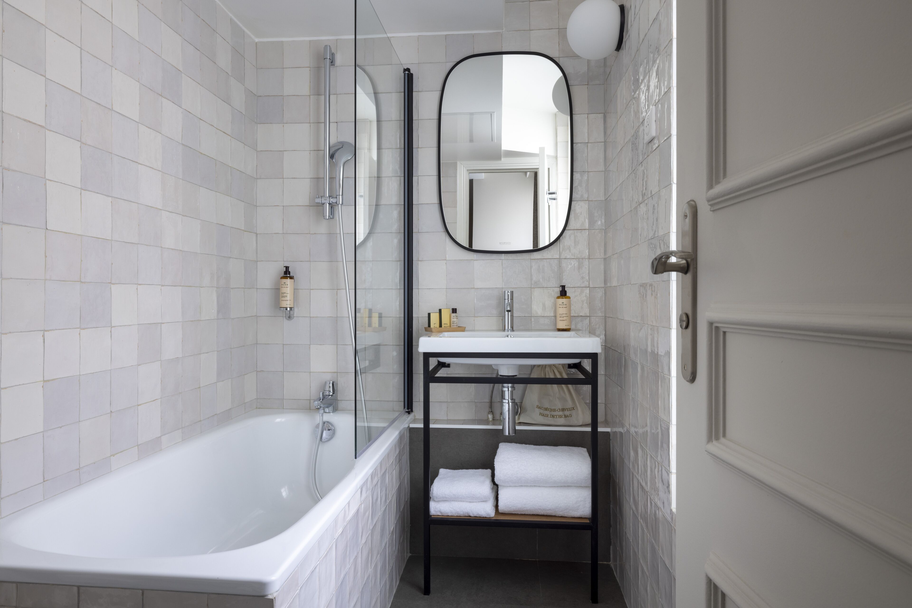 superior room | bathroom | designer toiletries, hair dryer, towels, soap