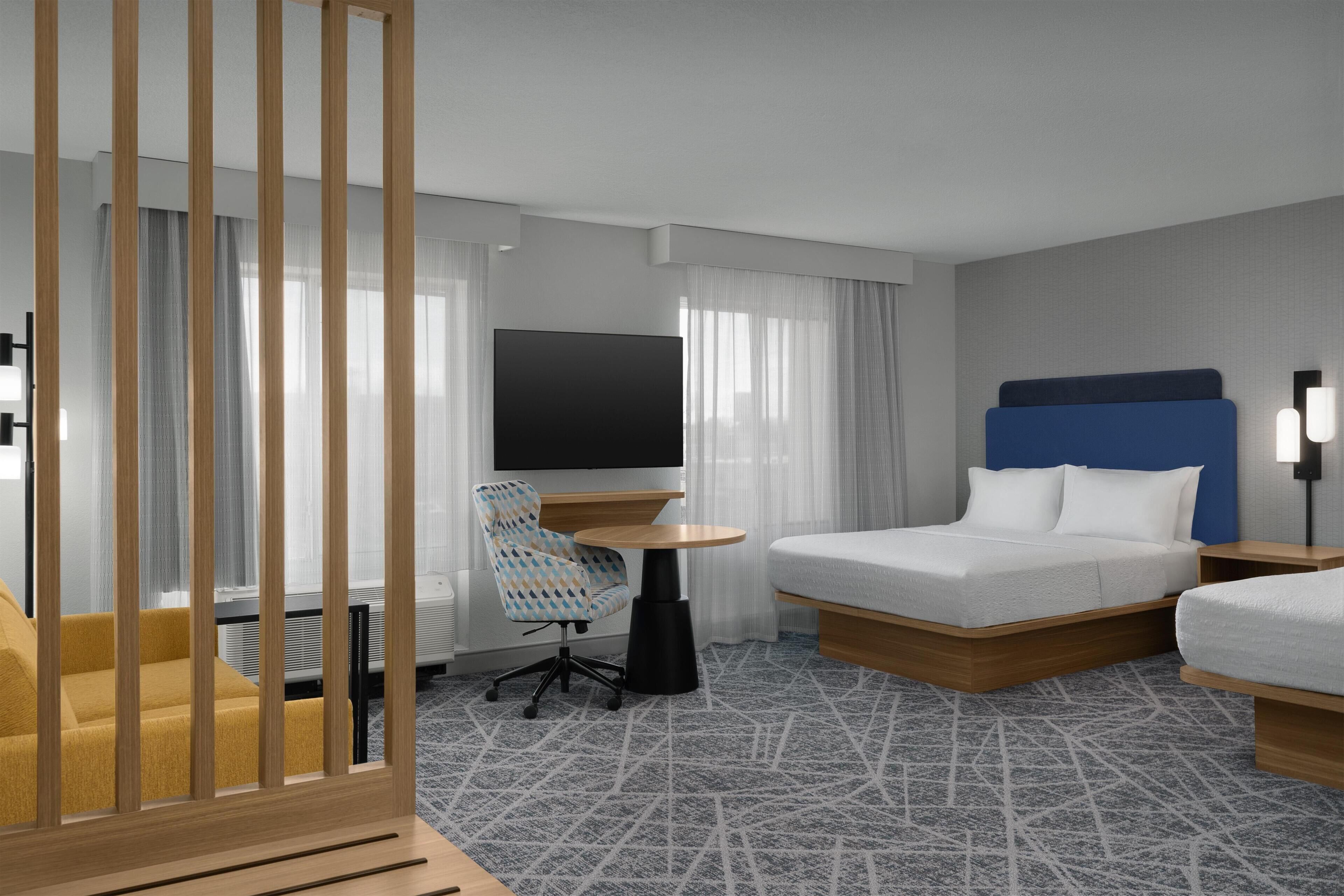 Studio, 2 queen-senger, i-r, sovesofa | Oppholdsområde | En 32-tommers Flatskjerm-TV med kabel-kanaler samt TV