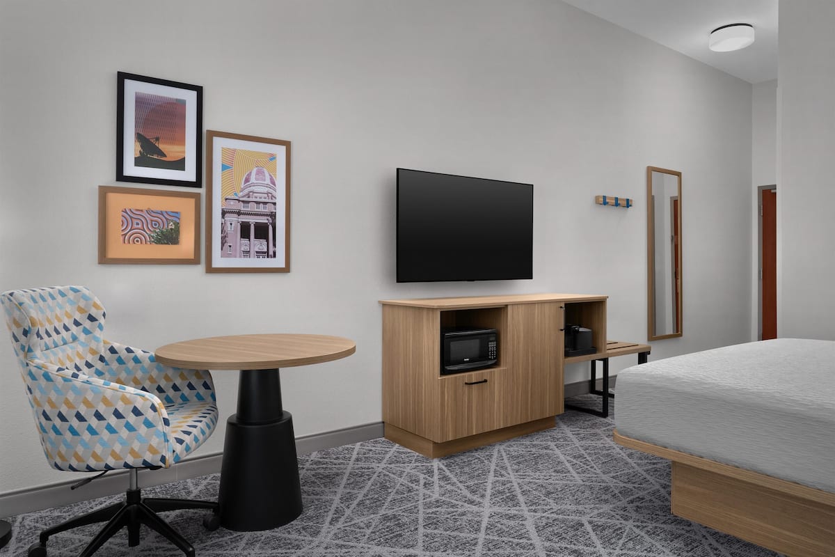 One King Bed Nonsmoking | Desk, blackout curtains, iron/ironing board, free cots/infant beds