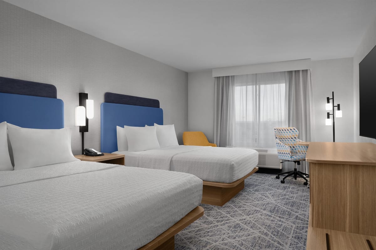 Two Queen Beds Nonsmoking | Desk, blackout curtains, iron/ironing board, free cots/infant beds