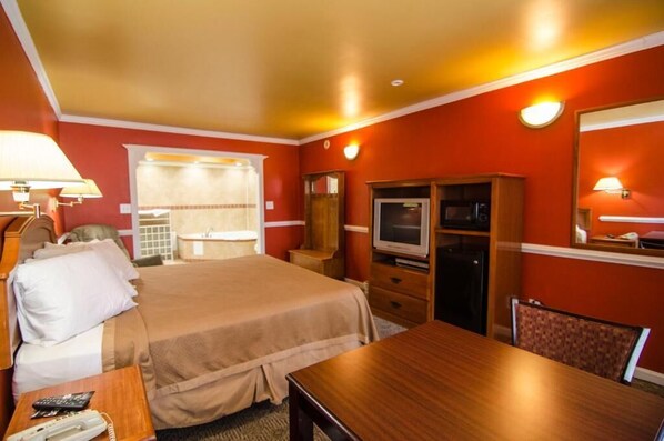 Premium bedding, desk, blackout curtains, free WiFi - Sunset Inn (Jacksonville)