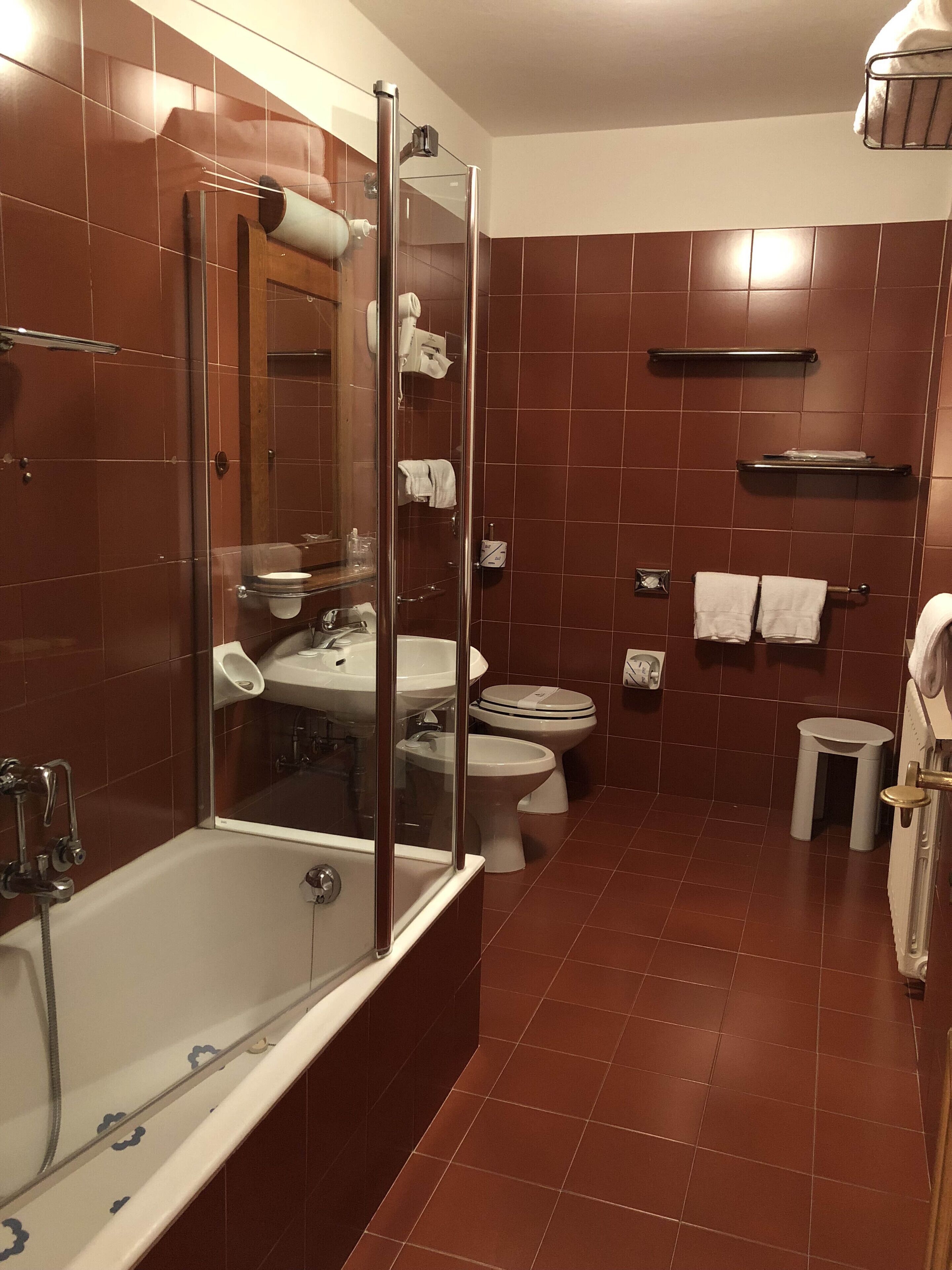 deep-soaking bathtub, free toiletries, hair dryer, slippers