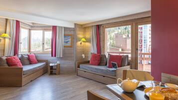 Standaard appartement | Woonruimte | Flatscreentelevisie
