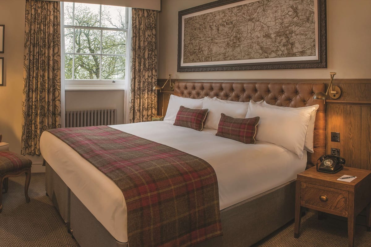 Premium bedding, down comforters, desk, iron/ironing board