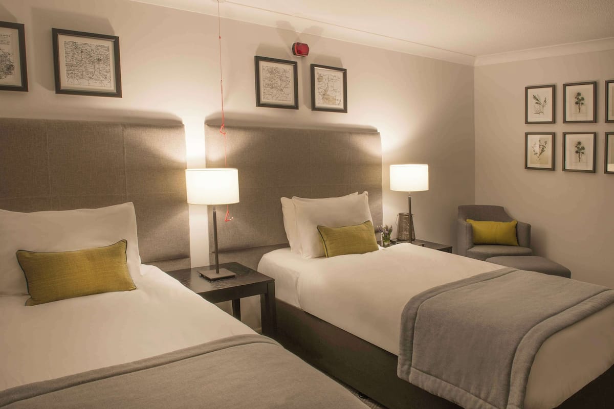 Premium bedding, down comforters, desk, iron/ironing board