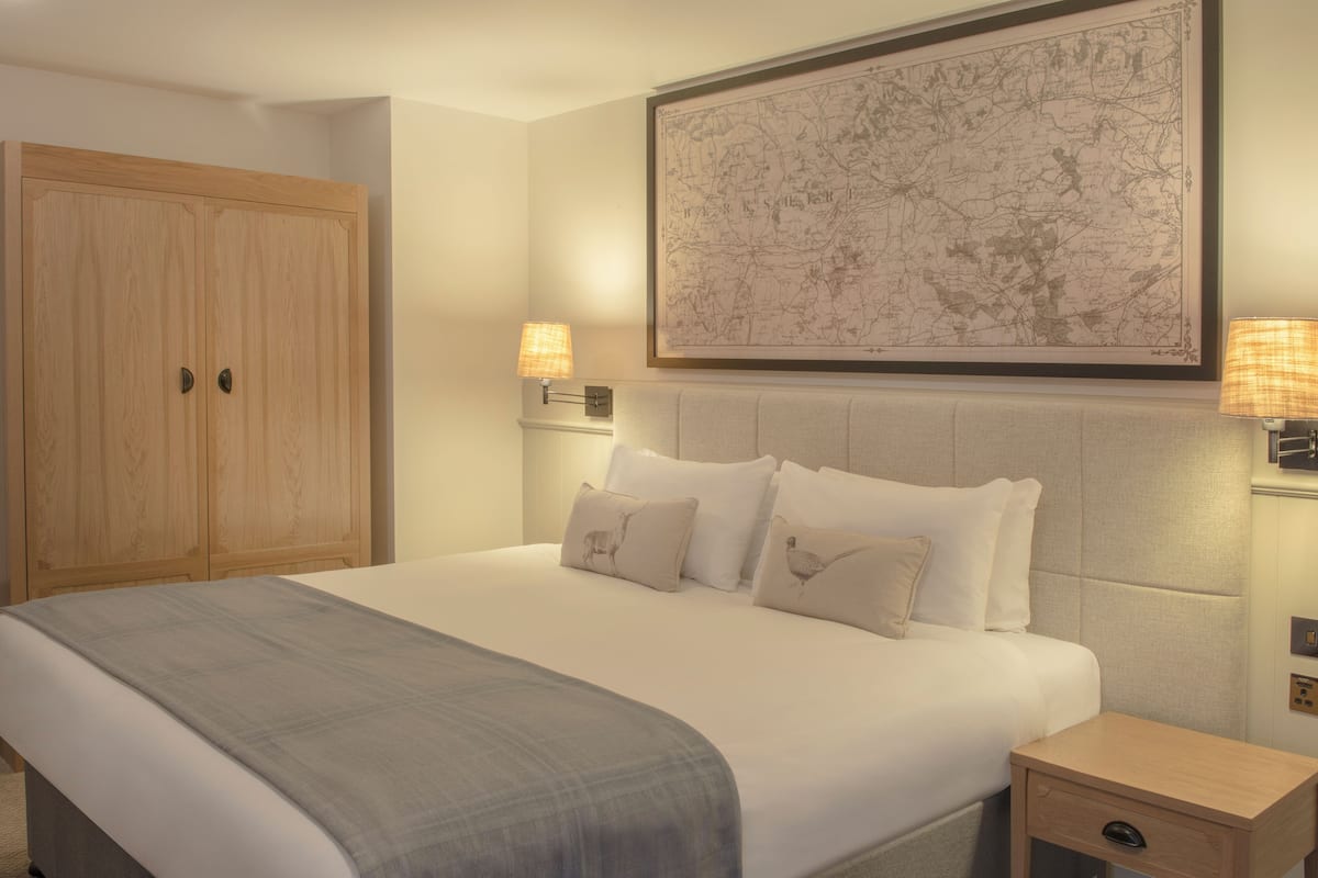 Premium bedding, down comforters, desk, iron/ironing board