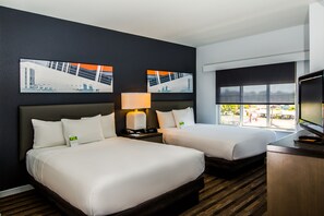 Literie de qualité, coffre-fort, bureau, rideaux d’obscurcissement