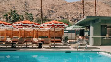 Outdoor pool, open 8:00 AM to 10:00 PM, cabanas (surcharge)