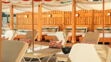 Outdoor pool, open 8:00 AM to 10:00 PM, cabanas (surcharge)