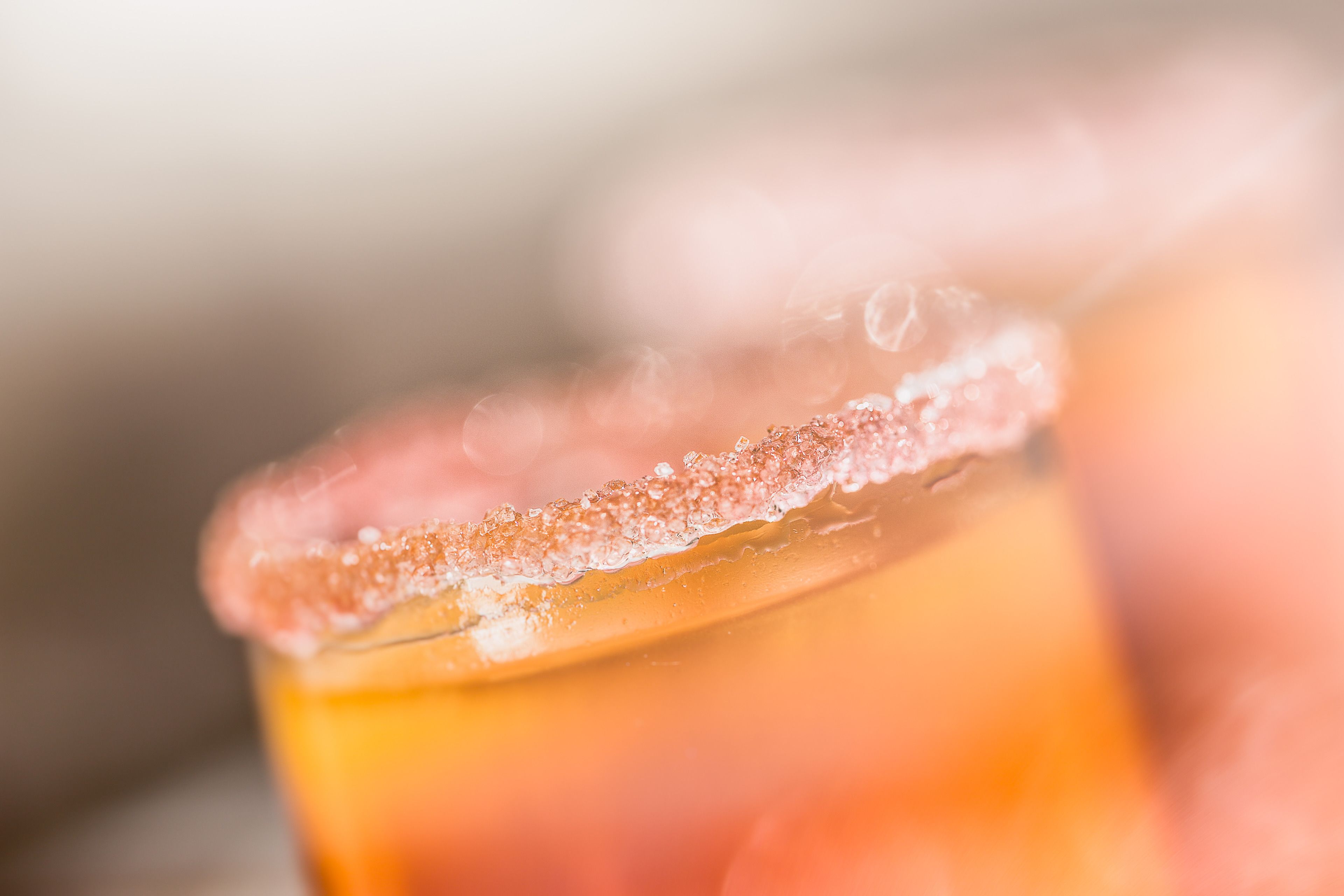 A close-up of a beverage with a salted rim.