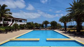 Outdoor pool, pool umbrellas, pool loungers