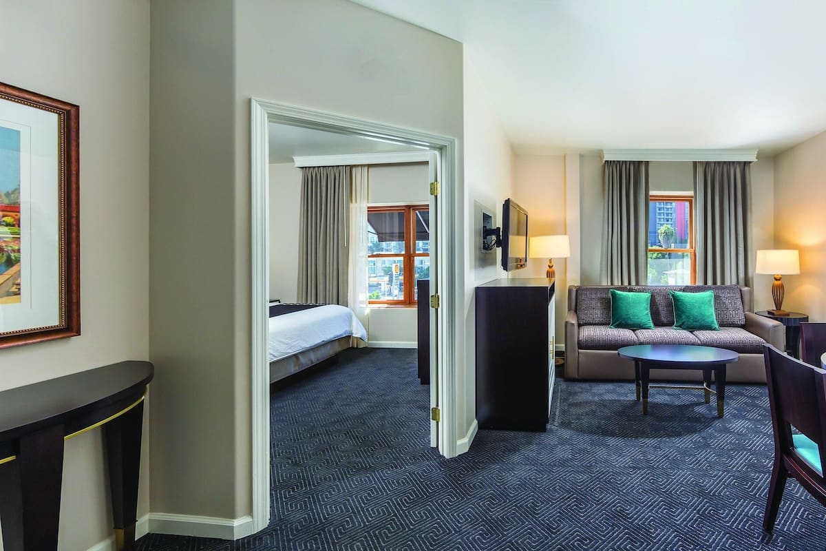 Blackout drapes, iron/ironing board, WiFi (surcharge), bed sheets