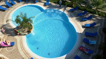 Seasonal outdoor pool, pool umbrellas, pool loungers