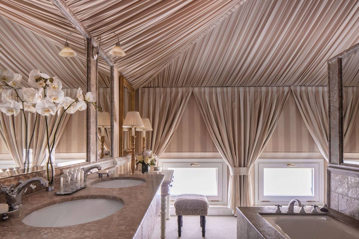 suite (atic suite) | bathroom | deep-soaking bathtub, rainfall showerhead, eco-friendly toiletries
