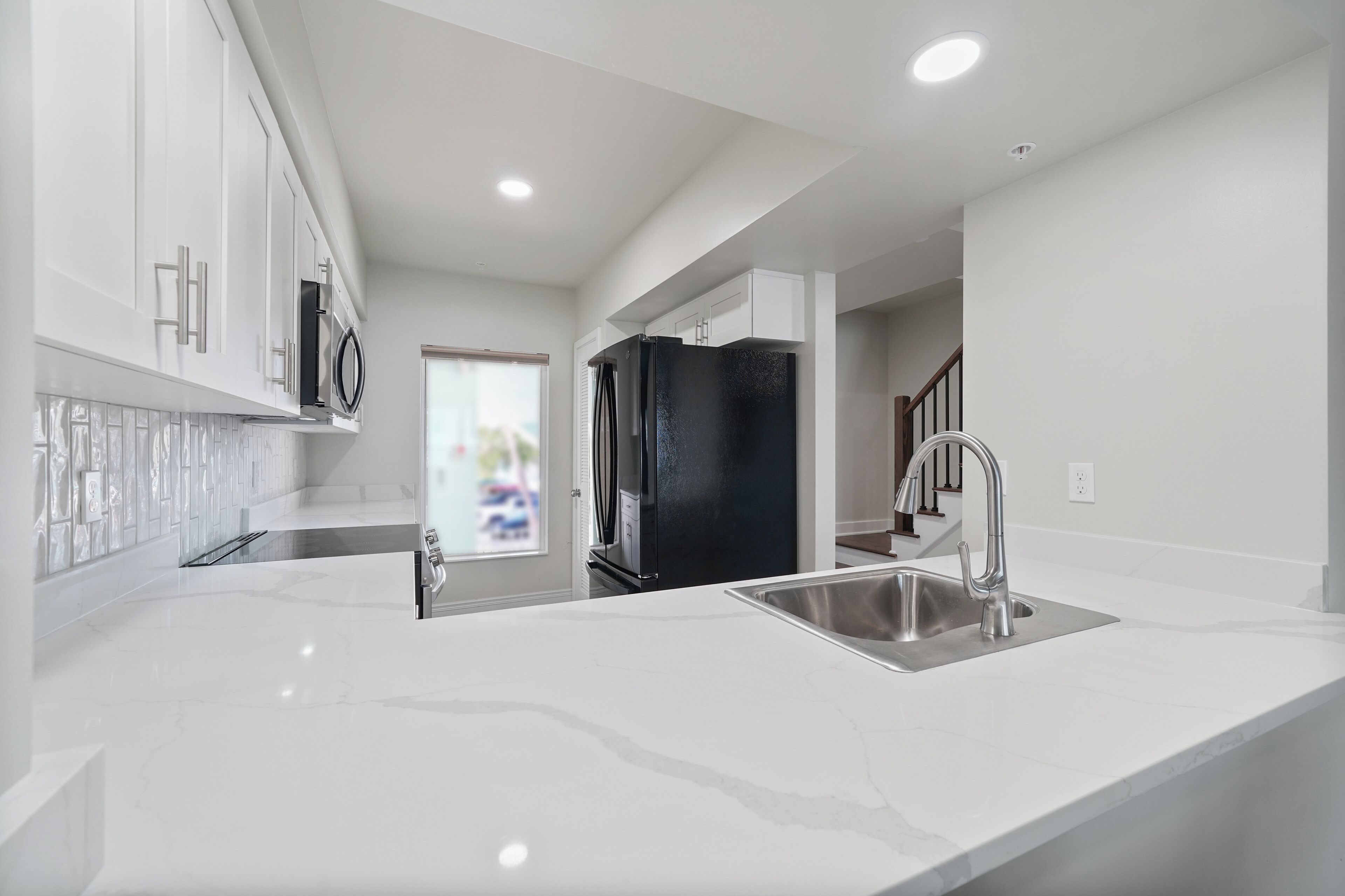 Royal Palm Two Bedroom Townhome | Private kitchen | Fridge, microwave, oven, stovetop