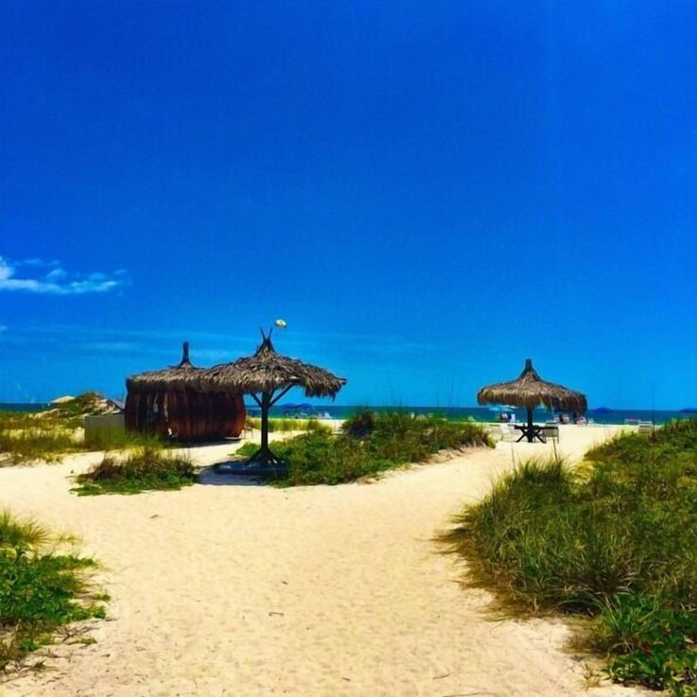 private beach nearby, beach umbrellas, beach towels, beach massages