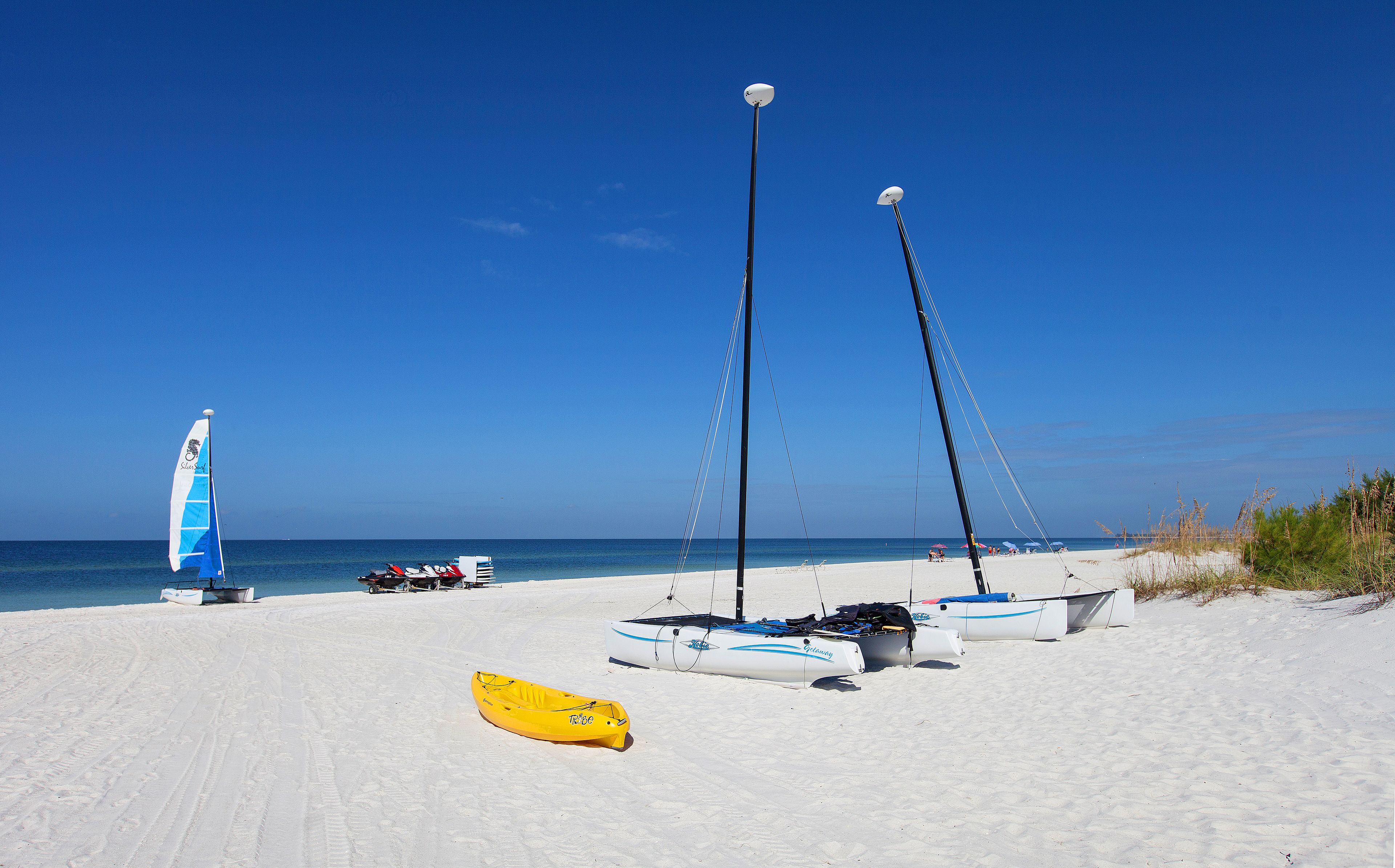Private beach nearby, beach umbrellas, beach towels, beach massages
