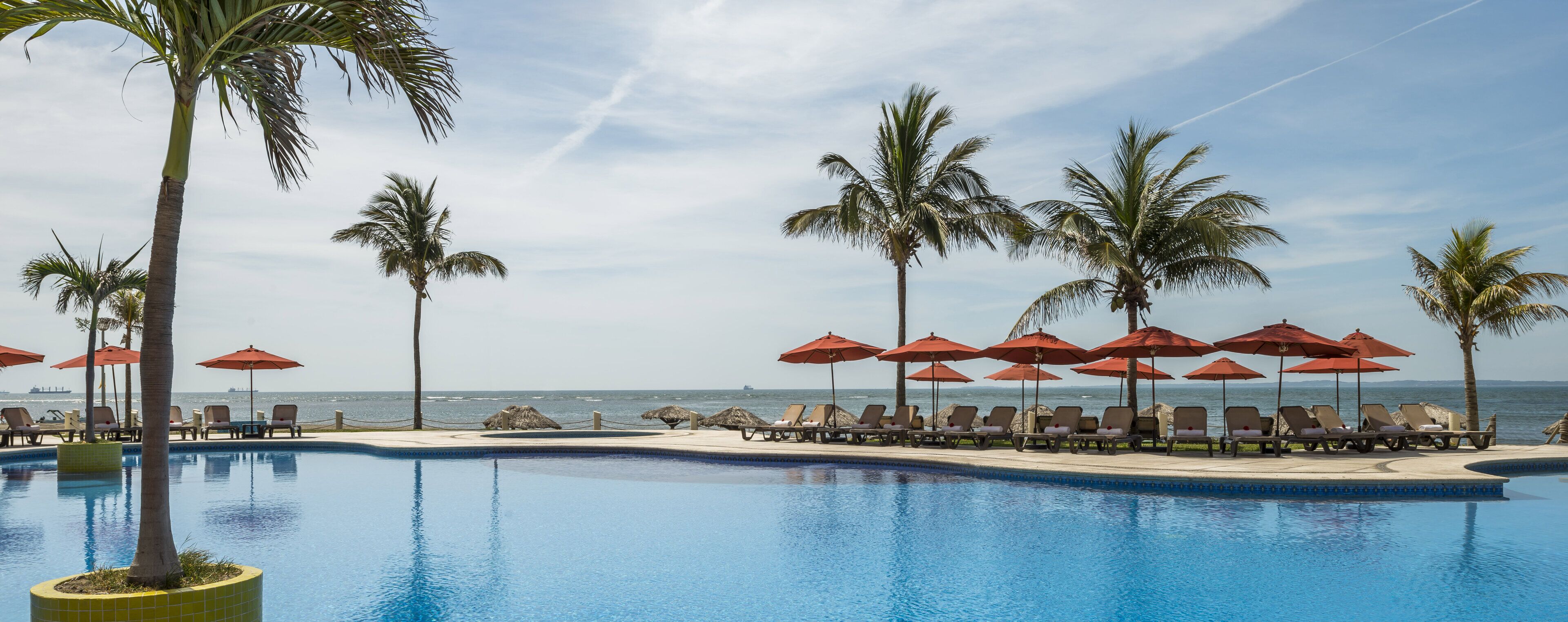 outdoor pool, open 8:00 am to 8:00 pm, pool umbrellas, pool loungers