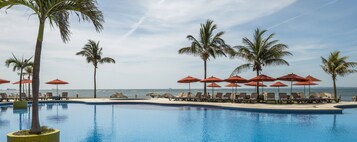 Outdoor pool, open 8:00 AM to 8:00 PM, pool umbrellas, sun loungers