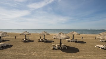 On the beach, beach towels