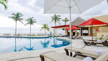 Outdoor pool, open 8:00 AM to 8:00 PM, pool umbrellas, pool loungers