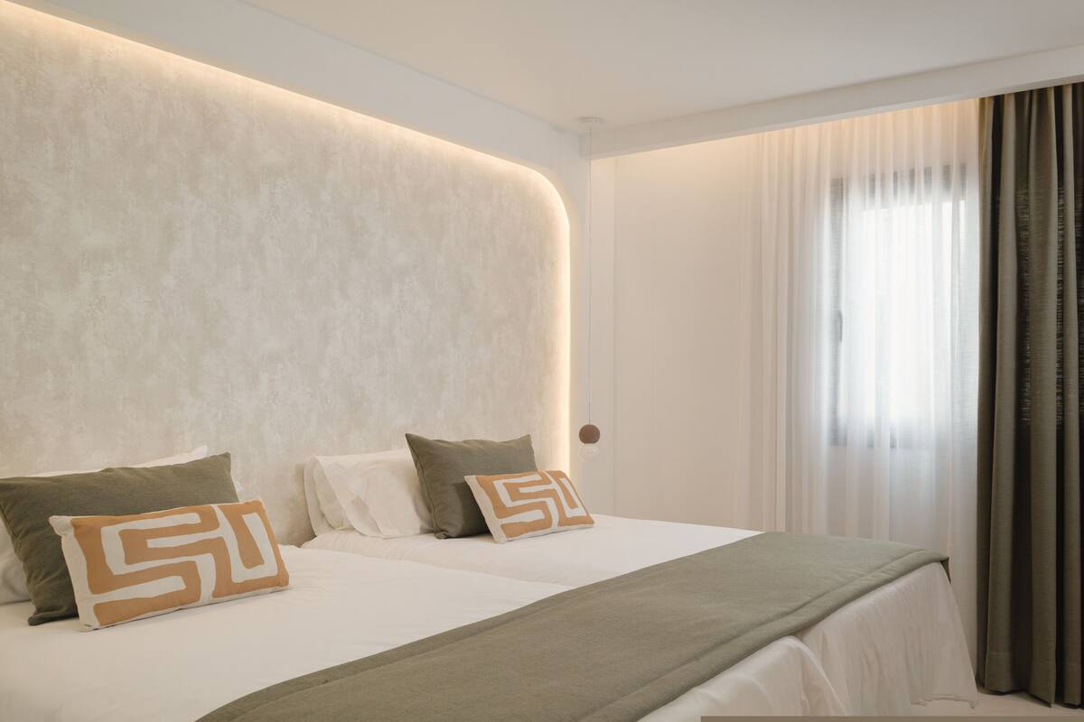 Classic Suite, Pool View | Minibar, in-room safe, laptop workspace, iron/ironing board