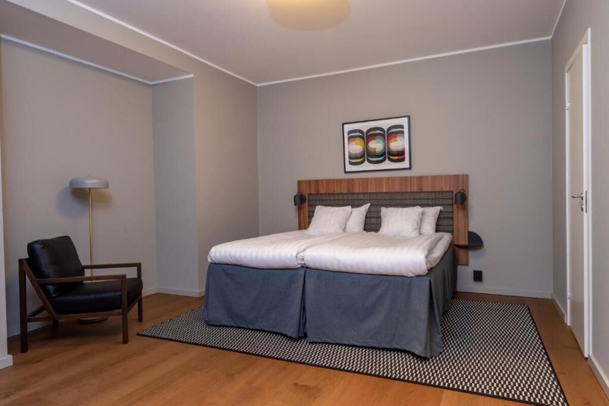 Desk, blackout drapes, bed sheets