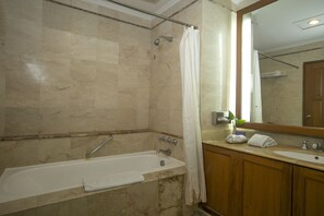 Combined shower/bathtub, spring water bathtub, towels, soap