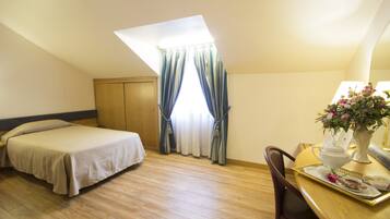 Single Room | Down duvets, minibar, in-room safe, desk