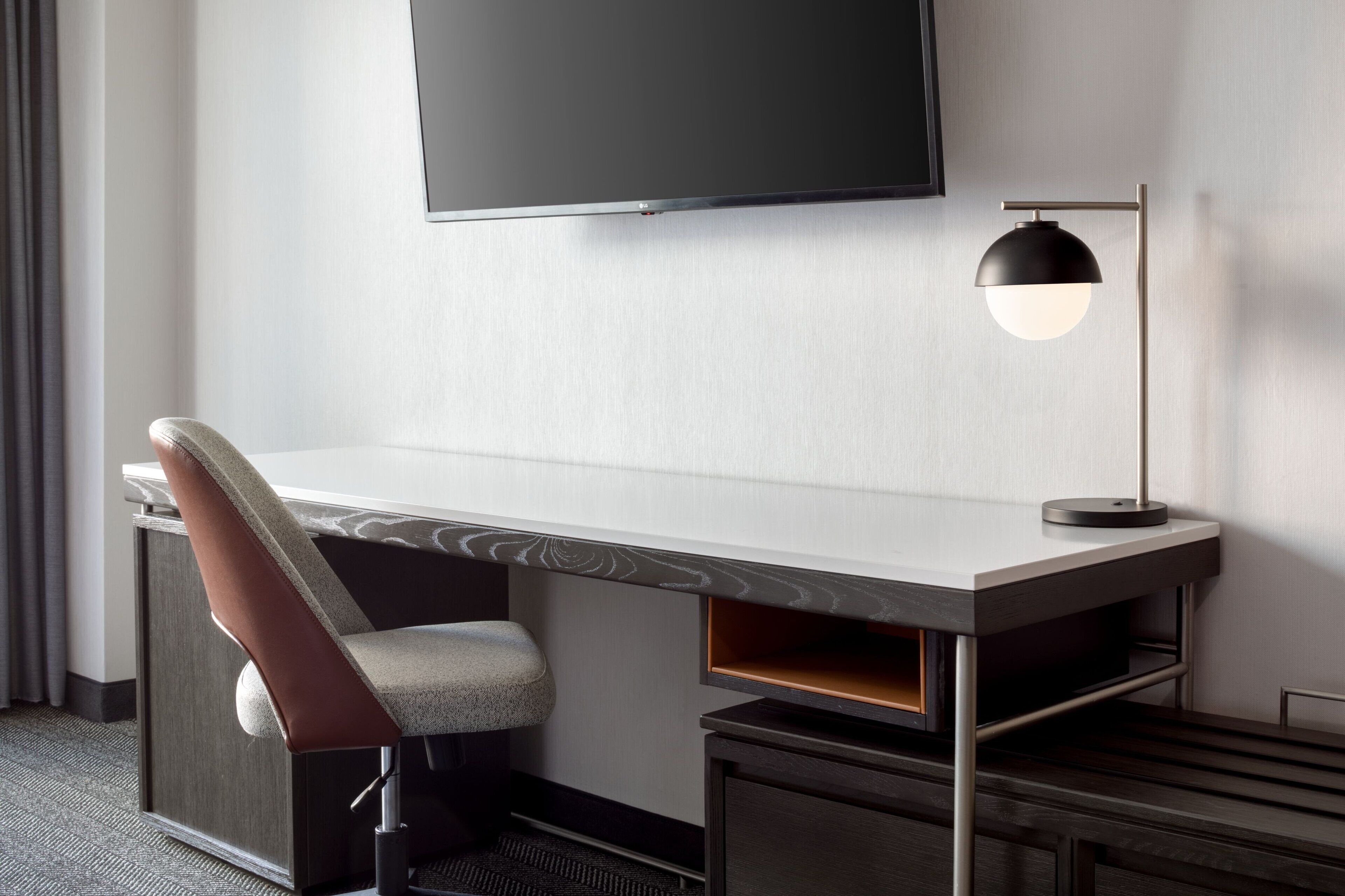 premium bedding, pillow-top beds, laptop workspace, iron/ironing board