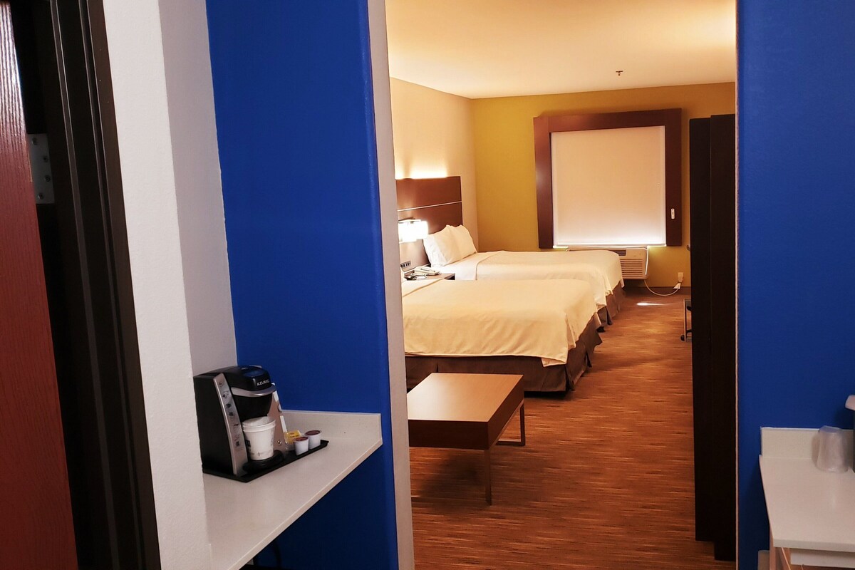 In-room safe, desk, iron/ironing board, cribs (free)