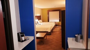 A hotel room with two beds, a coffee machine, and a desk with a lamp. - Holiday Inn Express Hotel & Suites Weslaco by IHG (Weslaco)